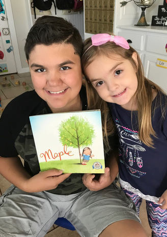 kids-holding-book