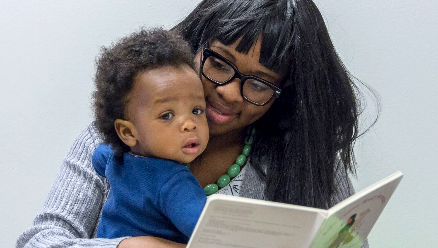 Mother and boy reading