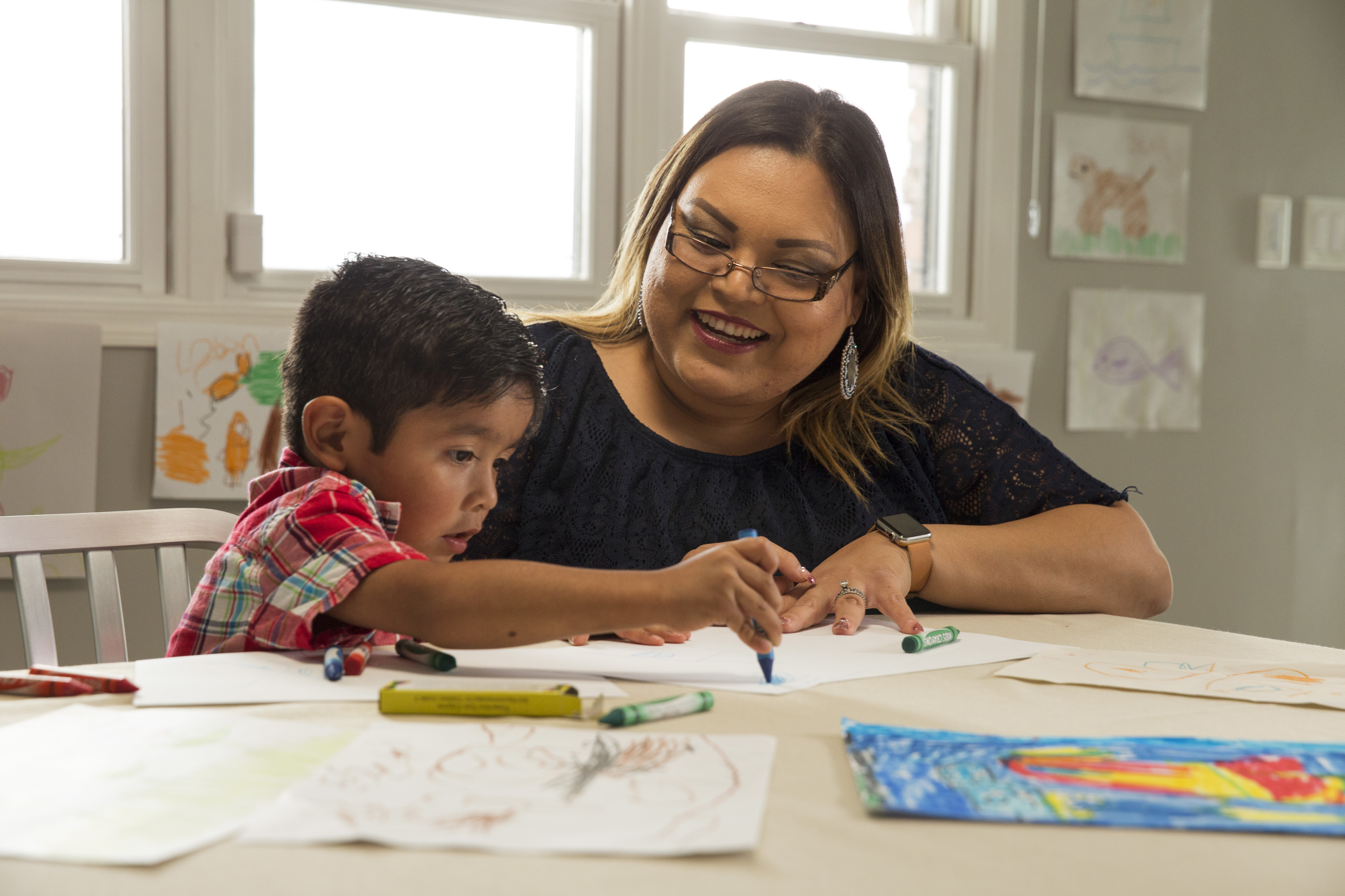 mom and son with crayons