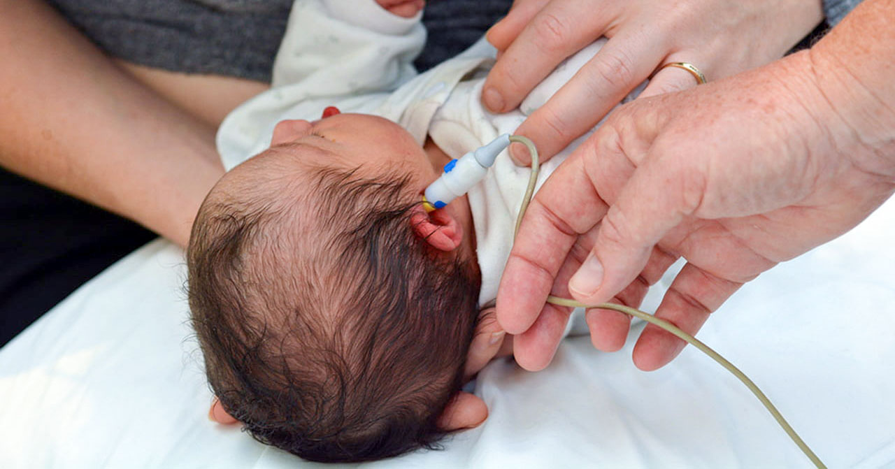 newborn getting a hearing test