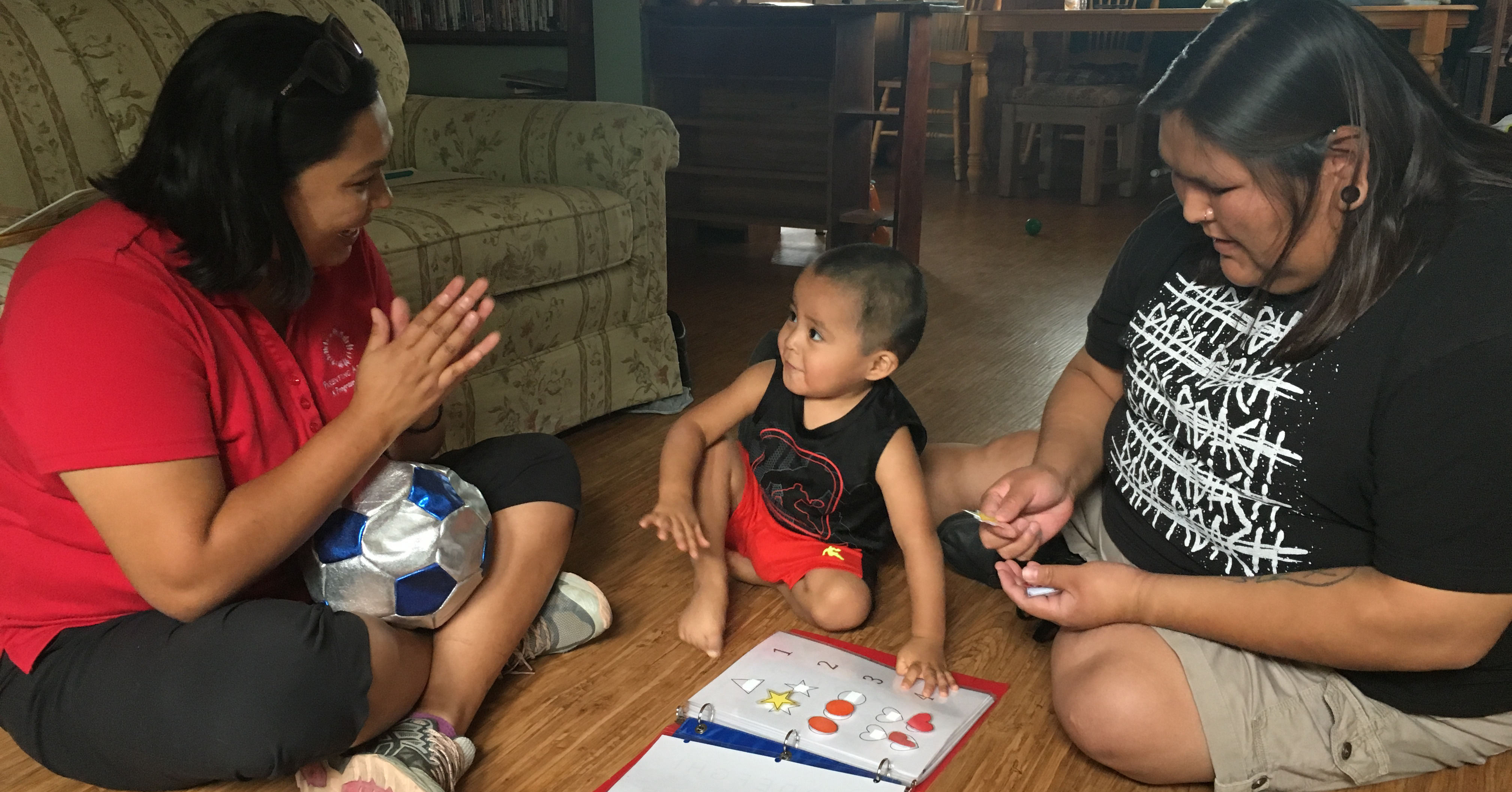 Mother and son with parent educator