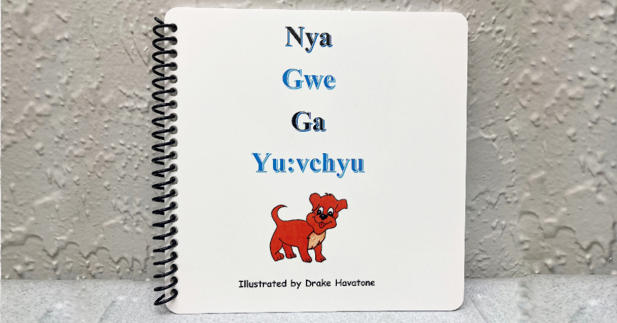 picture of small book with a dog illustration and Hualapai words for dog