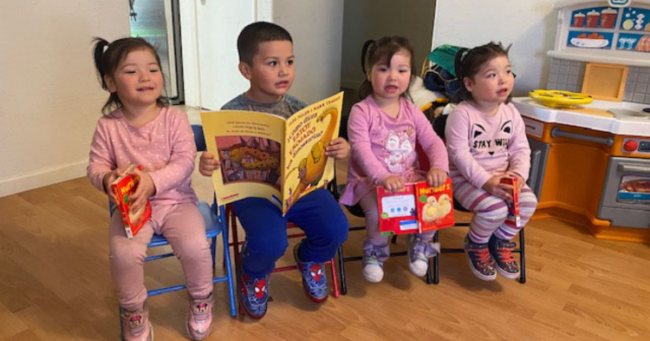 family resource centers, four siblings sit in chairs next to each other